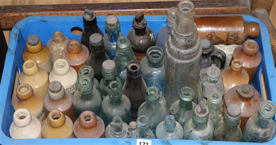 A quantity of ceramic and glass bottles